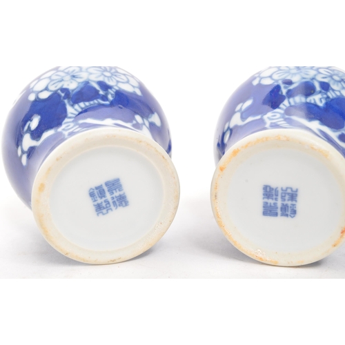 374 - Two small 20th Century Chinese blue and white ceramic ginger jars with prunus blossom decoration and... 