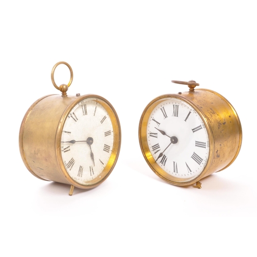 378 - Two early 20th Century brass campaign / travel drum alarm clocks. White clock faces with Roman numer... 