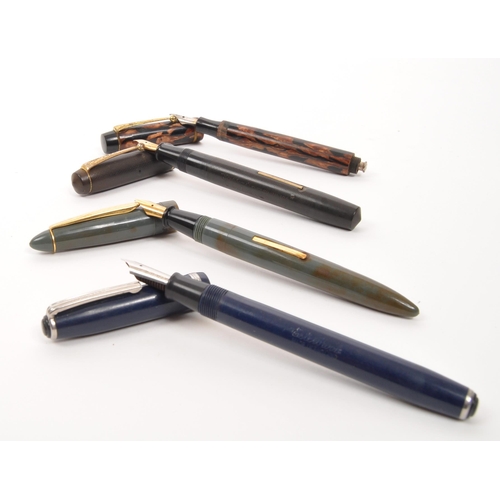 379 - A collection of assorted lever fill fountain pens to include one Queensway example with a 14ct gold ... 