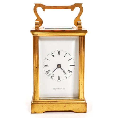 380 - An original Mappin & Webb brass cased carriage mantel clock set within bevelled glass panel side... 