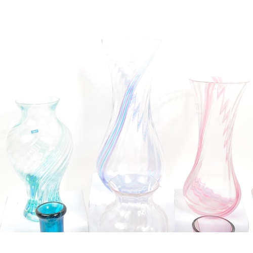 39 - Caithness - A large 20th Century collection of Caithness glass items comprising of vases in various ... 