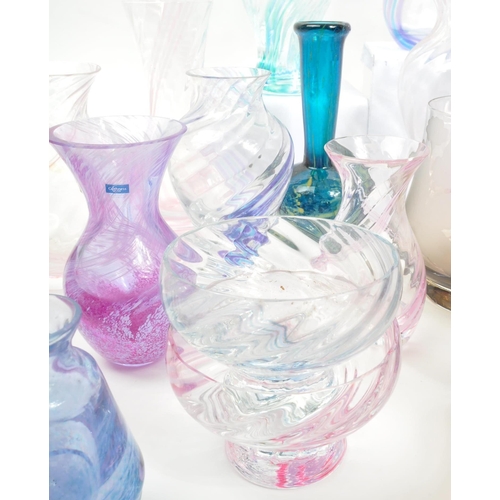 39 - Caithness - A large 20th Century collection of Caithness glass items comprising of vases in various ... 