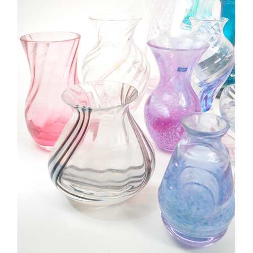 39 - Caithness - A large 20th Century collection of Caithness glass items comprising of vases in various ... 