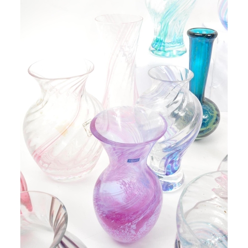 39 - Caithness - A large 20th Century collection of Caithness glass items comprising of vases in various ... 