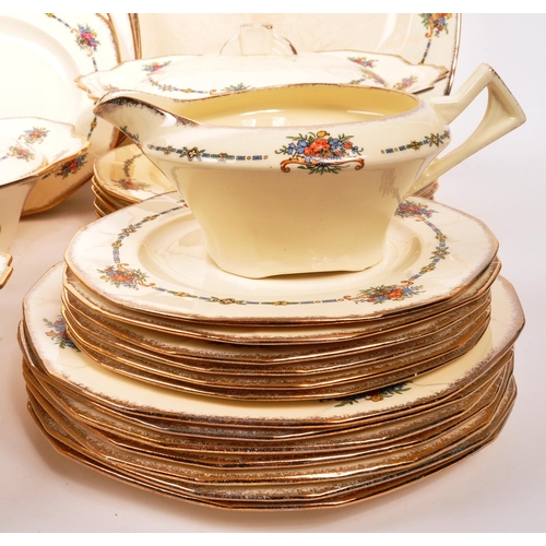 395 - Alfred Meakin - An extensive mid 20th century Alfred Meakin dinner service. The service including a ... 