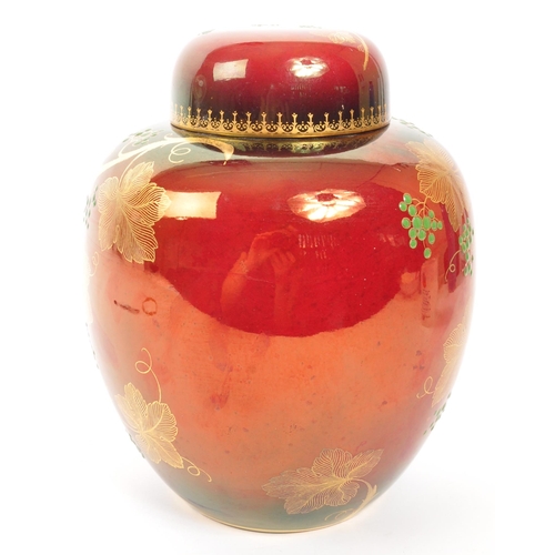 396 - Carlton Ware - A mid 20th century Carlton Ware Rouge Royale lidded ginger jar. The jar having a roug... 