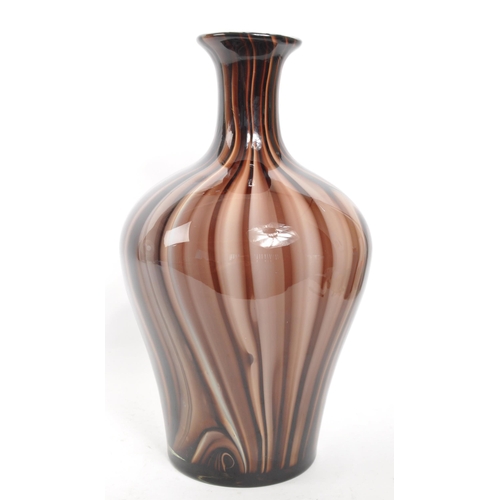 399 - A large mid 20th century studio art glass vase. Having marble effect throughout with flared neck / o... 