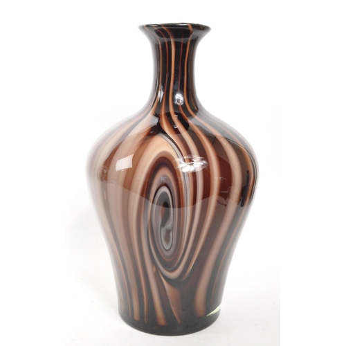 399 - A large mid 20th century studio art glass vase. Having marble effect throughout with flared neck / o... 