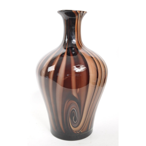 399 - A large mid 20th century studio art glass vase. Having marble effect throughout with flared neck / o... 