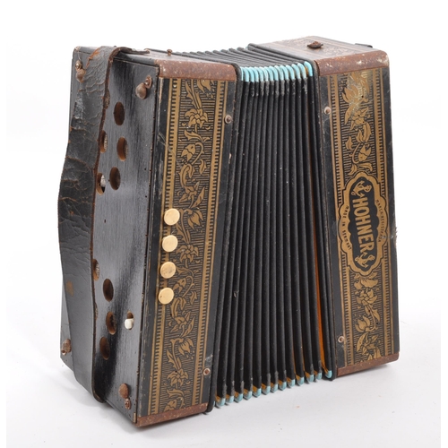 412 - An early 20th Century circa 1910s / 20s Hohner ten button diatonic piano accordion musical instrumen... 