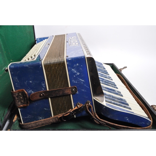 418 - Sivori - A vintage mid 20th century Italian Sivori piano accordion. The accordion having body in a b... 