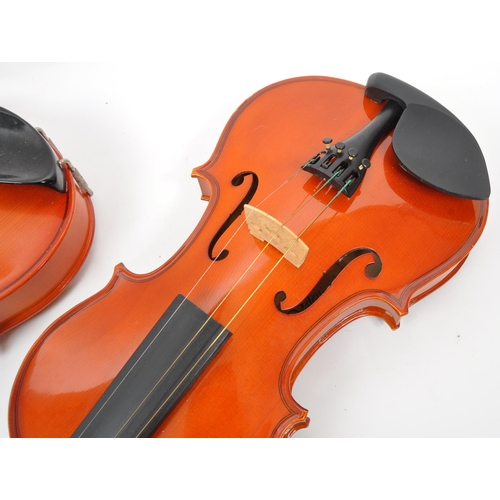 421 - A cased Valentino violin and bow. Together with a Shimro Stradivaro copy violin and bow, complete wi... 