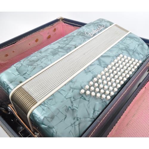 426 - A vintage 20th Century Italian Galanti made accordion with carry case. The accordion having a green ... 