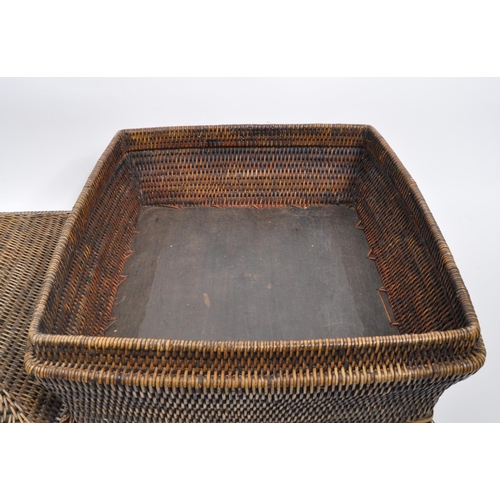 434 - A large Chinese bamboo wicker storage basket in Pagoda shape set on a wooden base with plaited detai... 