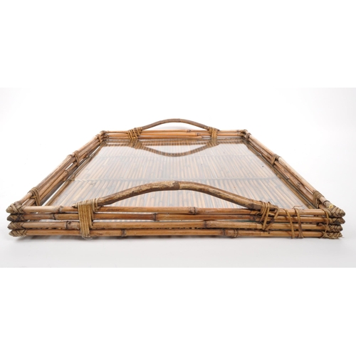 439 - A large bamboo butlers tray / serving tray with glass top, two carry handles and rattan weaves and p... 