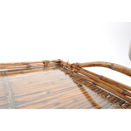 439 - A large bamboo butlers tray / serving tray with glass top, two carry handles and rattan weaves and p... 