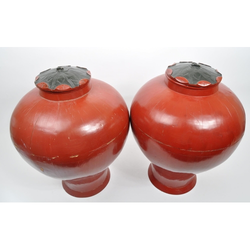 442 - Pair of red lacquered Chinese Asian lidded vase / urns / planters. Bulbous form, wooden construction... 