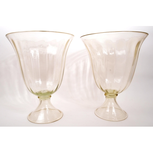 445 - A pair of large 20th century glass vase urns. With a large circular tapering bowl, clear glass with ... 