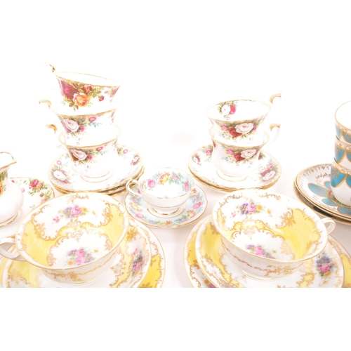 452 - A collection of assorted fine bone china cabinet cups and saucers to include Royal Crown Derby, Roya... 