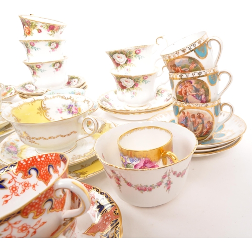 452 - A collection of assorted fine bone china cabinet cups and saucers to include Royal Crown Derby, Roya... 