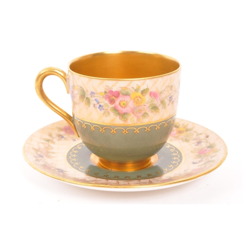 455 - An early 20th Century 1930s Royal Worcester gold plated cup and saucer with olive green and floral d... 