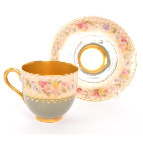 455 - An early 20th Century 1930s Royal Worcester gold plated cup and saucer with olive green and floral d... 