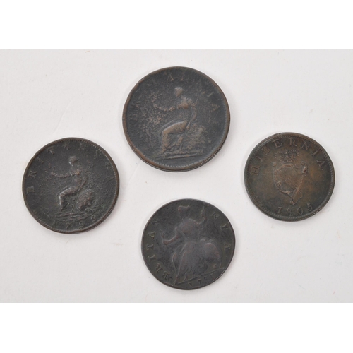 463 - A 18th century 1733 George II United Kingdom halfpenny coin, alongside three George III copper coins... 