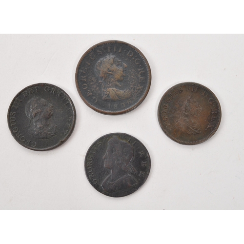 463 - A 18th century 1733 George II United Kingdom halfpenny coin, alongside three George III copper coins... 