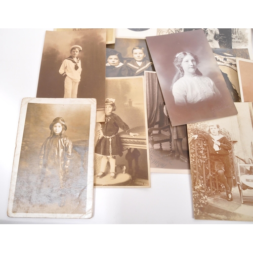 472 - Social History. Collection (approx. 750) real photo postcards of young people and children depicting... 