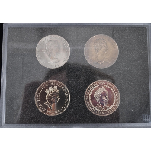 498 - A collection of gold plated Royal Family photographic coins comprising Her Majesty Queen Elizabeth I... 