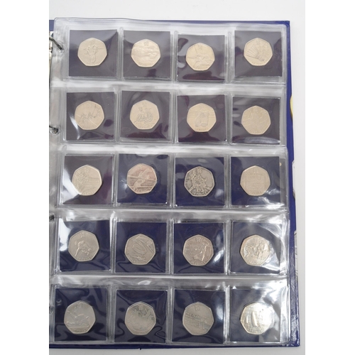 502 - A collection of 20th century British fifty pence 50p coins and two pound £2 coins to include approx ... 