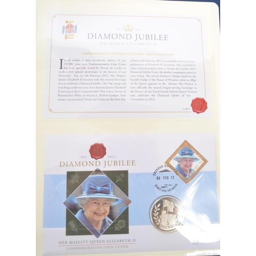 504 - A large collection of British and Overseas Territories mint commemorative coin covers. The collectio... 