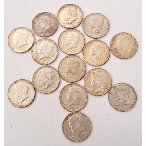 506 - A collection of USA ' Kennedy ' Half Dollar coins. Each of the 1964 half dollars being of .900 silve... 