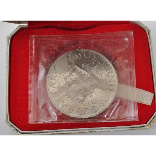 510 - Royal Mint - Two 1967 Royal Mint Gibraltar silver proof crown coins. The coins featuring Queen Eliza... 