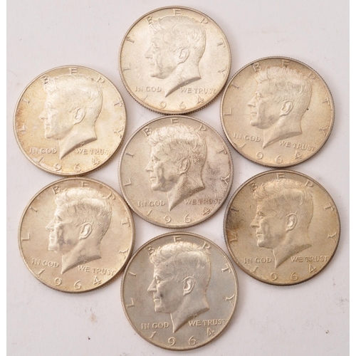 516 - A collection of USA 1964 ' Kennedy ' Half Dollar coins. Each of the half dollars being of .900 silve... 