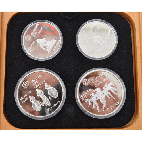 523 - Royal Canadian Mint - A 1972 Canadian Olympics silver proof coin set. The set including two silver 1... 