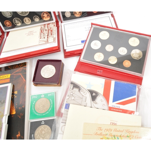 530 - Royal Mint - A collection of British 20th century commemorative coins and proof sets. The collection... 