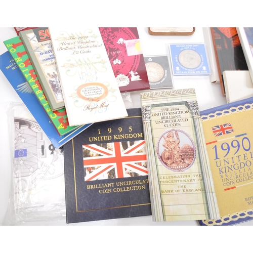 530 - Royal Mint - A collection of British 20th century commemorative coins and proof sets. The collection... 