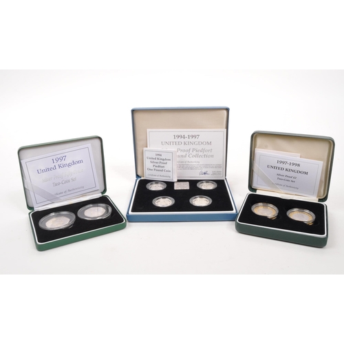 534 - Royal Mint - Numismatic Interest - Three 1990s Royal Mint silver proof coin collections. The collect... 