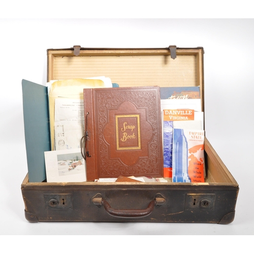 545 - A 20th century circa 1930s suitcase with Cunard White Star A Class cabin and other stickers to outsi... 