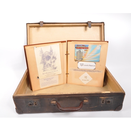 545 - A 20th century circa 1930s suitcase with Cunard White Star A Class cabin and other stickers to outsi... 