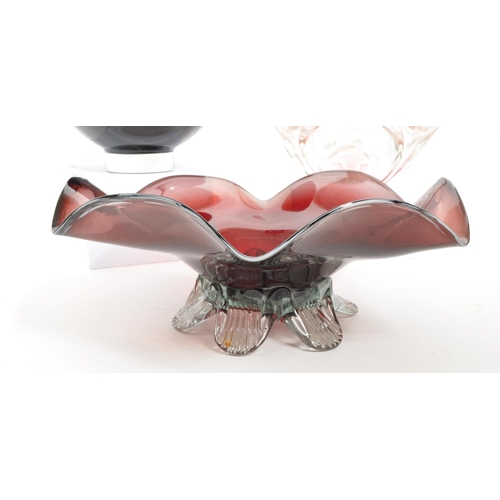 55 - A collection of three 20th Century studio art glass centrepiece bowls. One of circular form with swi... 