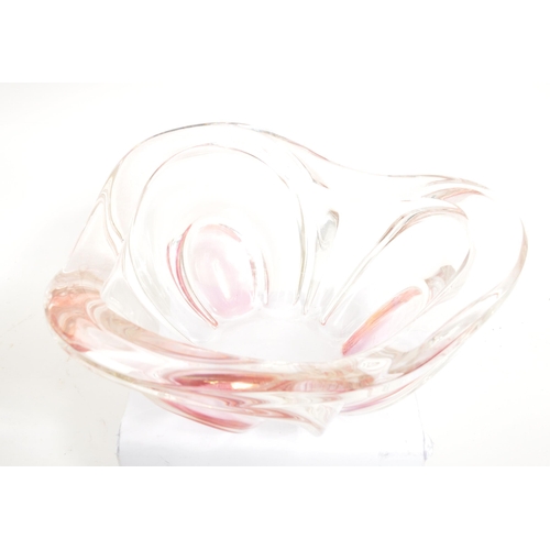 55 - A collection of three 20th Century studio art glass centrepiece bowls. One of circular form with swi... 