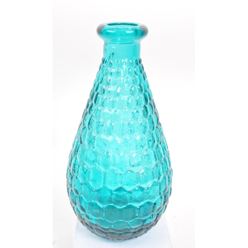 57 - A collection of mid 20th century glass decorative items. The collection to a Mdina style glass paper... 