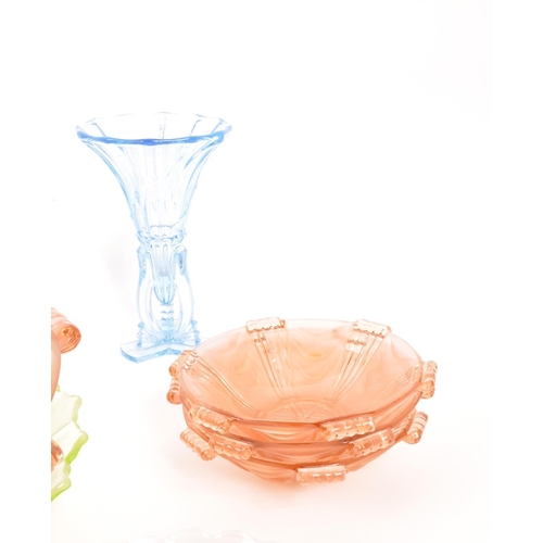 66 - A collection of 20th Century coloured Art Deco glass item. Comprising of pink centre piece bowl with... 