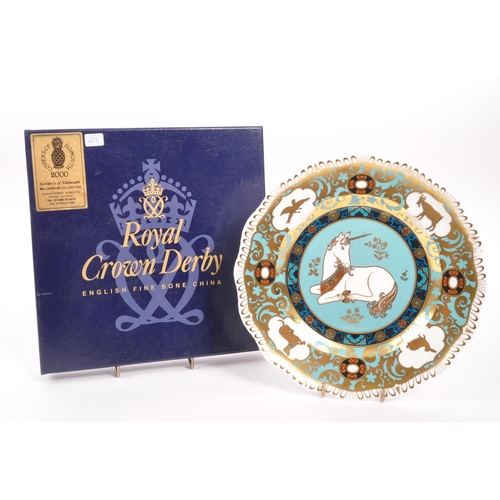 72 - Royal Crown Derby - A porcelain china limited edition Royal Crown Derby Millenium Unicorn plate desi... 