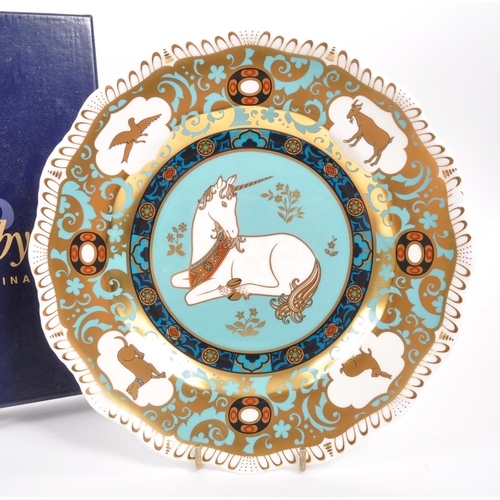 72 - Royal Crown Derby - A porcelain china limited edition Royal Crown Derby Millenium Unicorn plate desi... 