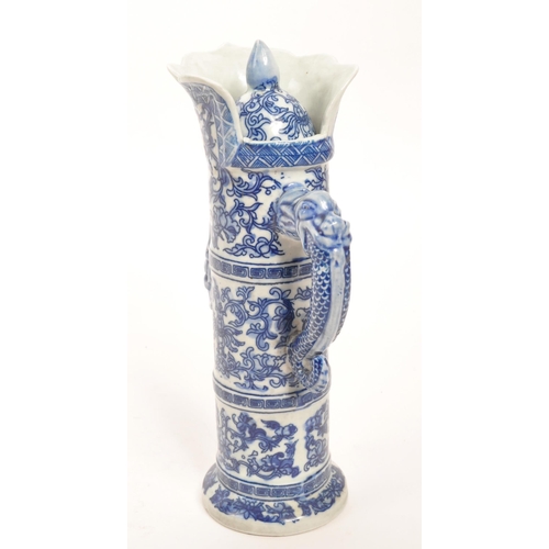 73 - A 20th Century vintage Chinese porcelain blue and white lidded wine pot / wine jug. Having floral mo... 