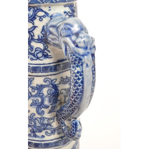 73 - A 20th Century vintage Chinese porcelain blue and white lidded wine pot / wine jug. Having floral mo... 