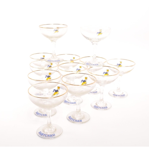 74 - Babycham - A collection of twelve 20th Century circa 1970s vintage Babycham champagne glasses. With ... 